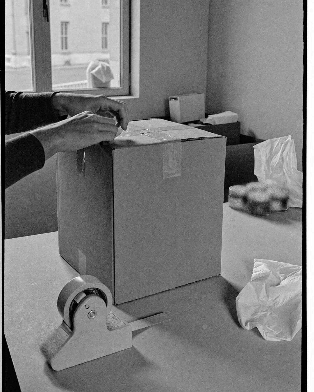 An order being taped shut, ready to ship